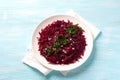 Healthy detox raw beetroot salad with red onion, garlic, herbs and spices