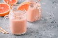 Healthy detox smoothie in mason jar of red grapefruit with banana and chia seeds Royalty Free Stock Photo