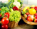 A healthy diet based on fresh organic fruits and vegetables, healthy food in wicker basket Royalty Free Stock Photo