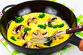 Healthy and Diet Food: Scrambled Eggs with Mushrooms and Vegetables Royalty Free Stock Photo