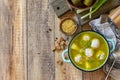 Healthy and diet food. Soup with meatballs and bulgur on a wooden table. Top view flat lay. Copy space.