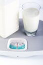 Healthy diet. Fresh Milk and weight measure meter