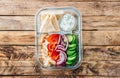 Healthy diet Gyros, greek pita bread wrapped sandwich with meat slices, tzatziki and fresh vegetables. Royalty Free Stock Photo