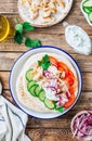 Healthy diet Gyros, greek pita bread wrapped sandwich with meat slices, tzatziki and fresh vegetables. Royalty Free Stock Photo