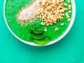 Healthy diet and nutrition concept. Green smoothie with organic kale leaves apple broccoli lime spinach, chia seeds, kiwi, muesli Royalty Free Stock Photo