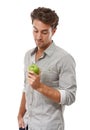 Healthy diet, nutrition and man with apple, food and isolated on a white background in studio. Person eating fresh green Royalty Free Stock Photo