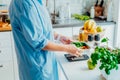 Healthy diet plan for weight loss, daily ready meal menu. Close up Woman weighing lunch box cooked in advance,ready to Royalty Free Stock Photo