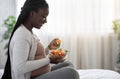Healthy Diet During Pregnancy. Black Expectant Woman Eating Vegetable Salat At Home Royalty Free Stock Photo