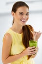 Healthy Diet. Woman Drinking Green Detox Juice. Lifestyle. Nutrition Drinks Royalty Free Stock Photo