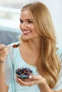 Healthy Diet. Woman Eating Cereal, Berries In Morning. Nutrition Royalty Free Stock Photo