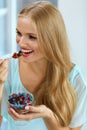 Healthy Diet. Woman Eating Cereal, Berries In Morning. Nutrition Royalty Free Stock Photo