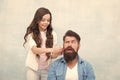 With healthy dose of openness any dad can excel at raising girl. Child making hairstyle styling father beard. Being