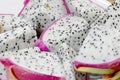 Healthy dragon fruit or pitaya pieces background, close up of beautiful fresh sliced dragon fruit with texture in the market in Royalty Free Stock Photo