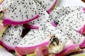 Healthy dragon fruit or pitaya pieces background, close up of beautiful fresh sliced dragon fruit with texture in the market in Royalty Free Stock Photo