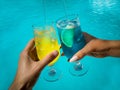 Healthy drink on a Caribbean beach. Pineapple and coconut handheld on the beach