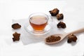 Healthy drink coffee from chaga mushroom in a glass cup on a white background. Top view. Copt spaes