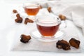 Healthy drink coffee from chaga mushroom in a glass cup on a white background. Top view. Copt spaes