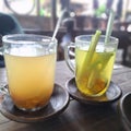 a healthy drink with fresh herbs called sekoteng and a honey lemon lemongrass drink Royalty Free Stock Photo