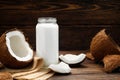 Healthy drink - vegan non dairy fresh coconut milk in glass bottle Royalty Free Stock Photo