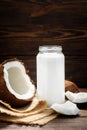 Healthy drink - vegan non dairy fresh coconut milk in glass bottle Royalty Free Stock Photo