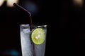 Healthy drinks, close up a glass of fresh lime soda with dark background, iced drinks fresh lime soda in cleared long glass, a Royalty Free Stock Photo