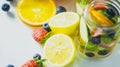 Healthy drinks made organic fruit from farm,detox fruit mixed with clear water,cool beverage summer refreshing, on white