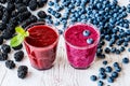 Healthy drinks. smoothies with blackberry and blueberry with ingredients.