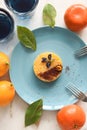 Healthy drinks and sweets. Lemon pie with Thai blue butterfly pea flower tea served with fresh fruits in blue plate on white Royalty Free Stock Photo