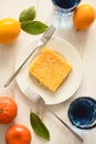 Healthy drinks and sweets. Lemon pie and Thai blue butterfly pea flowers tea served with fresh fruits on white background Royalty Free Stock Photo