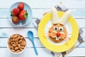 Healthy Easter Breakfast For Kids. Easter Bunny Shaped Pancake With Fruits Royalty Free Stock Photo