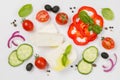 Healthy eating concept - selection of greek salad ingredients on white background Royalty Free Stock Photo