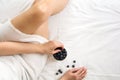 Healthy eating concept. Woman having blueberries in bed. Royalty Free Stock Photo