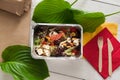 Healthy food in foil boxes, diet concept. Seafood salad Royalty Free Stock Photo