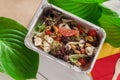 Healthy food in foil boxes, diet concept. Seafood salad Royalty Free Stock Photo