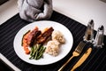 Healthy eating . diet food dinner dish. pork ribs and green bean, carrot , quinoa Royalty Free Stock Photo