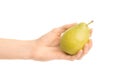 Healthy eating and diet Topic: Human hand holding green pear isolated on a white background in the studio Royalty Free Stock Photo