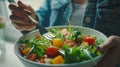 Healthy eating, dieting, vegetarian kitchen, and cooking concept - close-up of vegetable salad bowl and fork at home