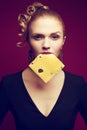 Healthy eating. Food concept. Arty portrait of girl eating cheese Royalty Free Stock Photo