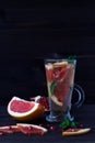 Healthy eating. fresh red cocktail with ripe grapefruit and pomegranate. detox water. diet healthy eating and weight loss concept, Royalty Free Stock Photo