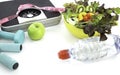 Healthy eating  green apple and salad as weight scale with Workout Royalty Free Stock Photo