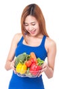 Healthy eating, happy young woman with vegetables