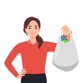 Healthy eating and lifestyle concept. Young smiling woman cartoon character standing with shopping bag Royalty Free Stock Photo