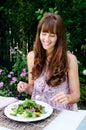 Healthy eating lifestyle woman having salad outdoors Royalty Free Stock Photo