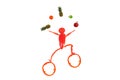 Healthy eating. Little funny juggler made ??of pepper.