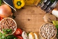 Healthy eating. Mediterranean diet. Fruit,vegetables, grain, nuts olive oil and fish on wood Royalty Free Stock Photo