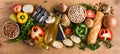 Healthy eating. Mediterranean diet. Fruit,vegetables, grain, nuts olive oil and fish on wood Royalty Free Stock Photo