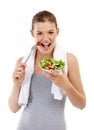 Healthy, eating and portrait, girl and salad in studio, white background and wellness for body. Health, vegan and Royalty Free Stock Photo