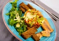 Salad from avocado, tomatoes and greens with trout Royalty Free Stock Photo