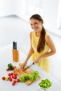 Healthy Eating. Woman Cooking Vegetable Salad. Diet, Lifestyle. Royalty Free Stock Photo