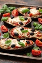 Healthy Eggplant or Aubergine pizza with tomato sauce, mozzarella cheese, basil and olives